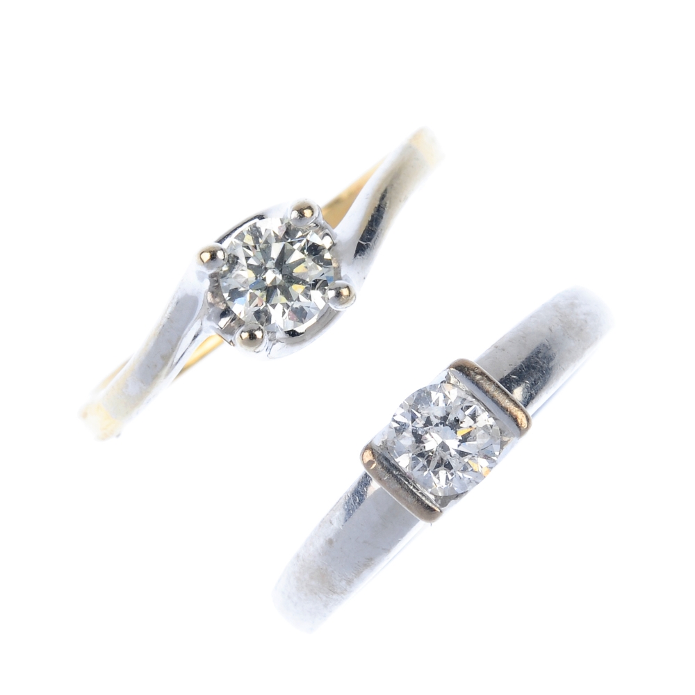 Two 18ct gold diamond single-stone rings. Each designed as a brilliant-cut diamond, one raised