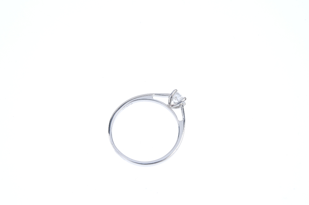A 9ct gold diamond single-stone ring. The brilliant-cut diamond, to the tapered shoulders and - Image 3 of 3
