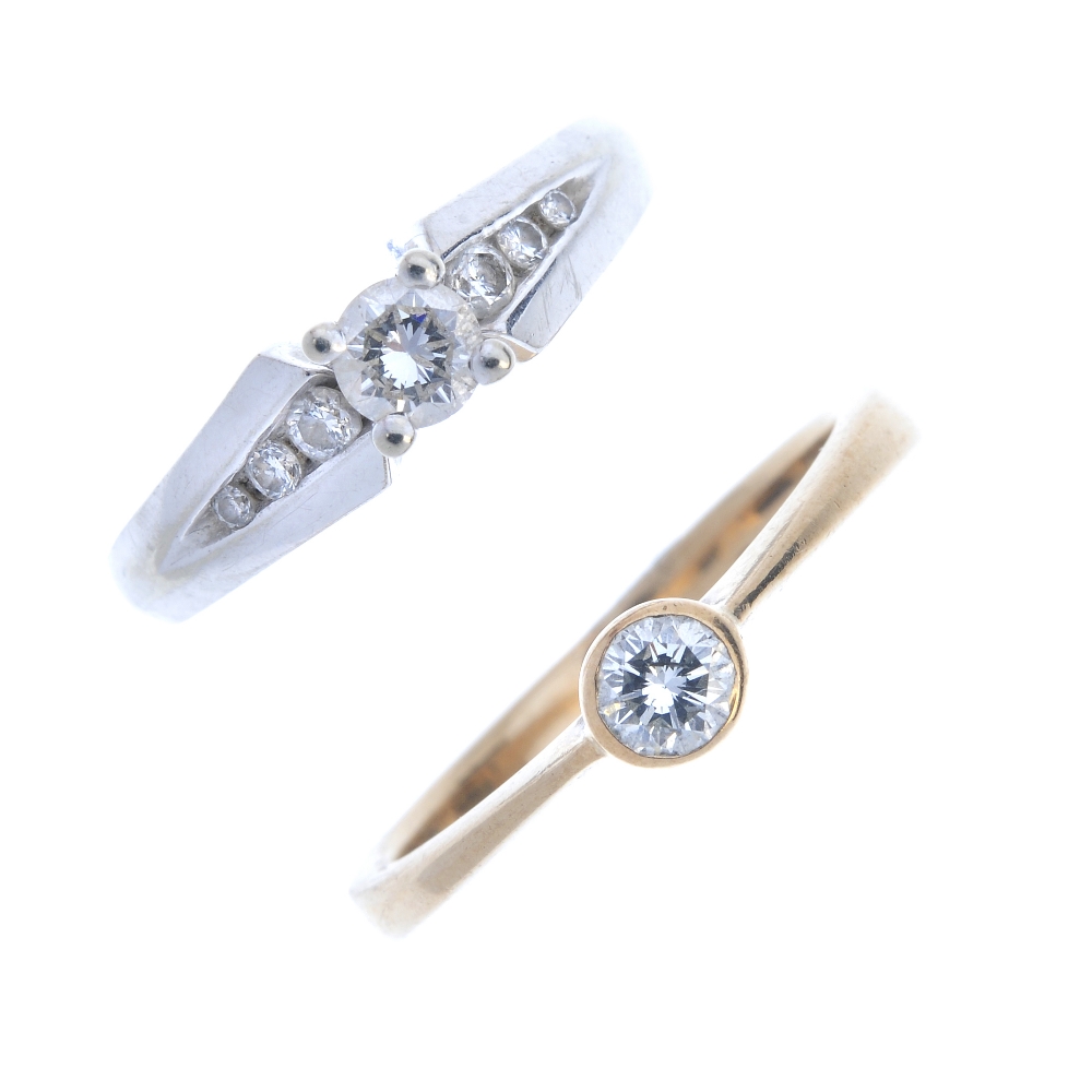 Two diamond single-stone rings. To include a 9ct gold brilliant-cut diamond ring with tapered