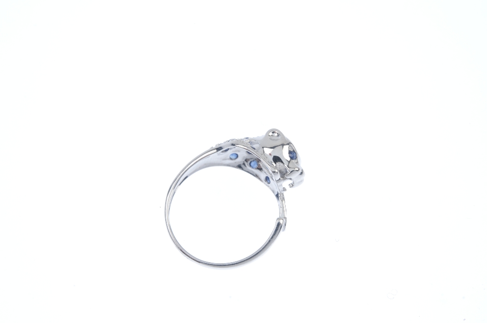 A 9ct gold sapphire and diamond leopard ring. Set with circular-shape sapphire and a single-cut - Image 3 of 3