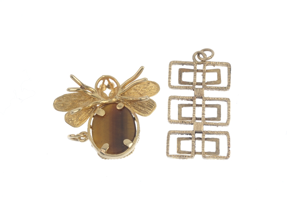 Two 1970s 9ct gold pendants. To include a tiger's-eye bee pendant, together with a vari-texture - Image 2 of 2