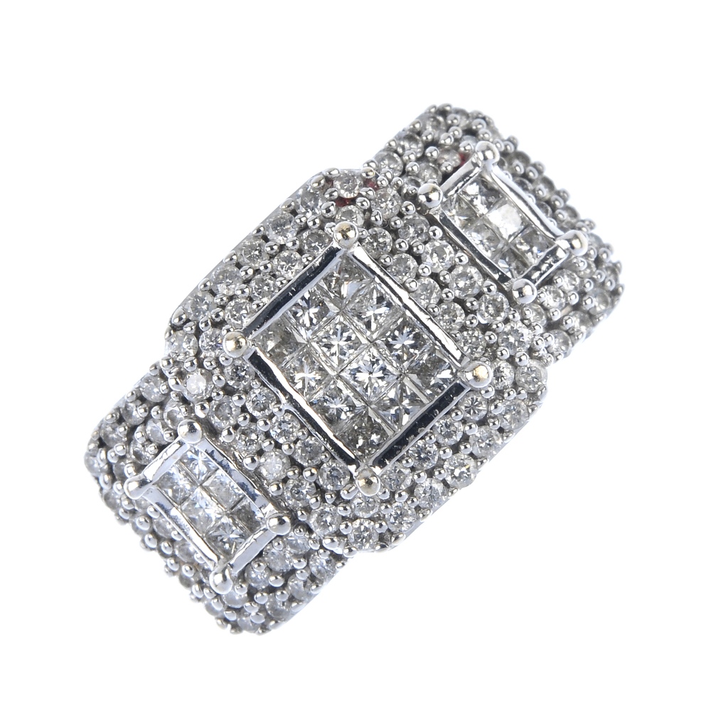 An 18ct gold diamond dress ring. The pave-set diamond rectangular-shape panel, with brilliant-cut