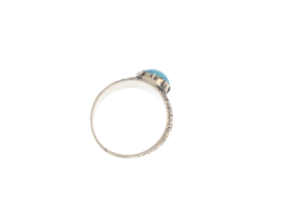 An early to mid 19th century gold turquoise single-stone ring. The oval turquoise cabochon, to the - Image 3 of 3