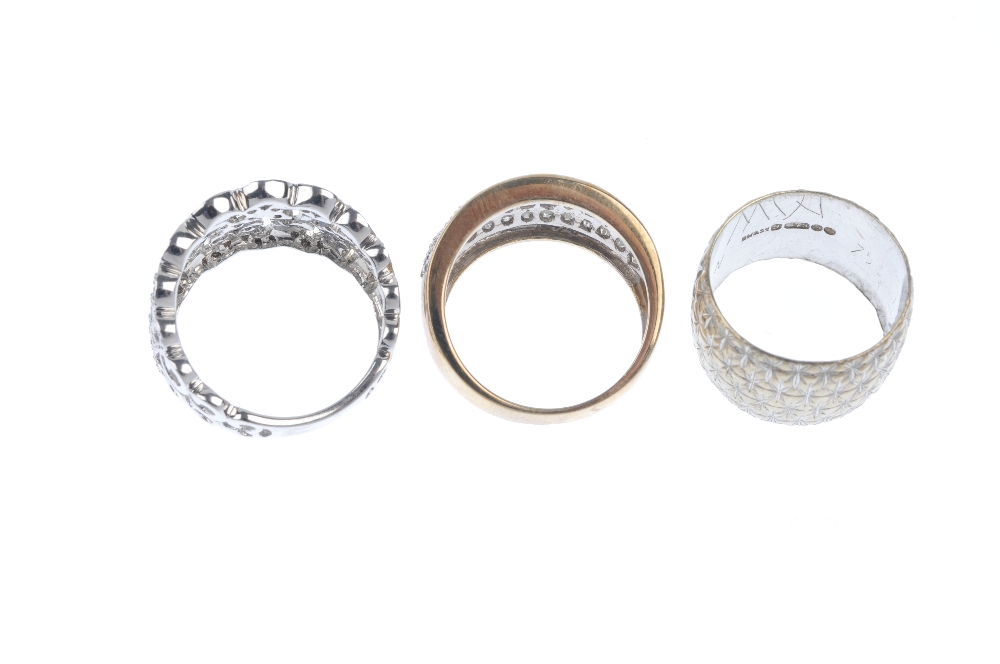 A selection of three 9ct gold rings. To include a diamond openwork scrolling ring, a diamond panel - Image 3 of 3