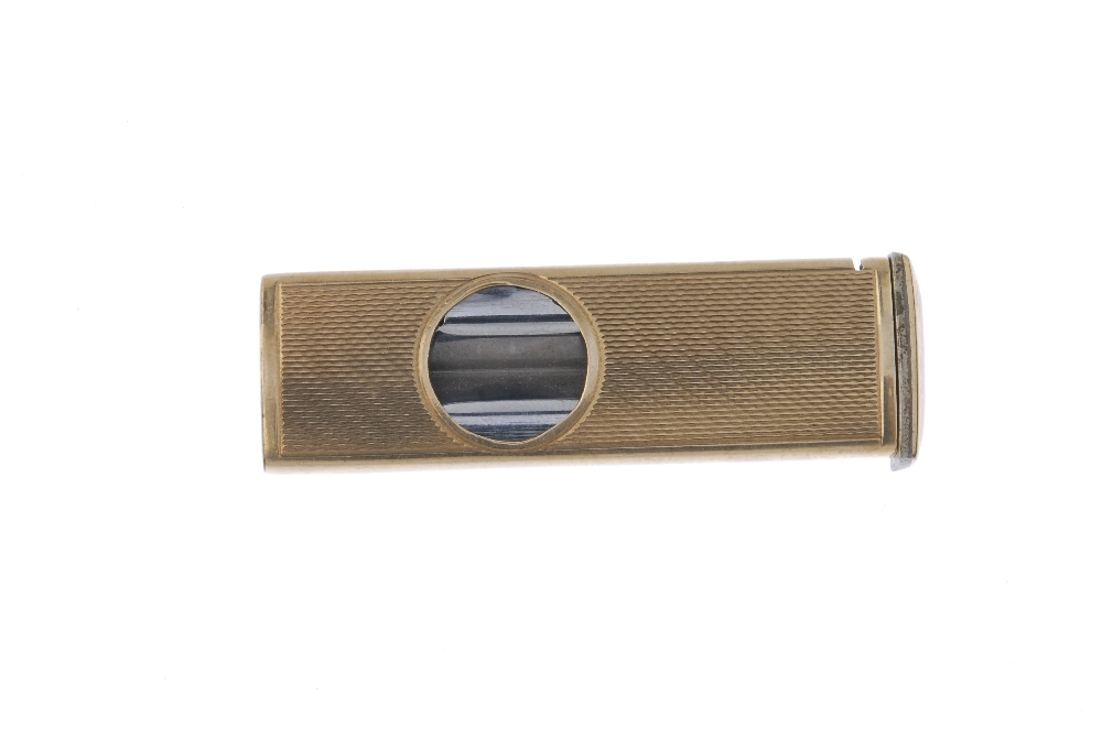 A 9ct gold cigar cutter. With engine turned case. Hallmarks for Birmingham, 1964. Length 5.5cms. - Image 2 of 3
