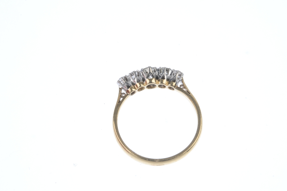 A mid 20th century 18ct gold diamond five-stone ring. The graduated old-cut diamond line, to the - Image 4 of 4