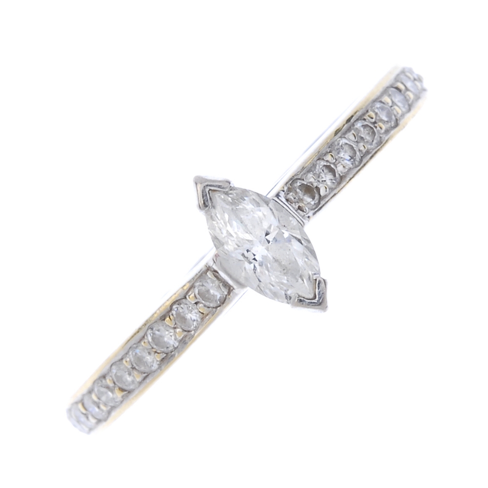 An 18ct gold diamond single-stone ring. The marquise-shape diamond, to the brilliant-cut diamond