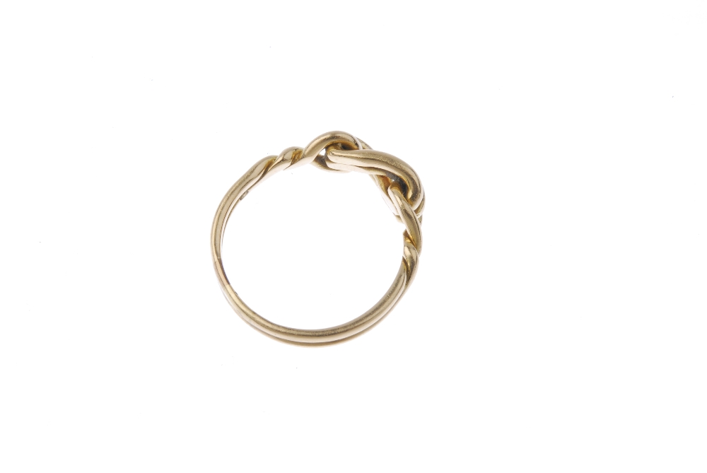 An early 20th century 18ct gold knot ring. Designed as a knot, with crossover shoulders and - Image 3 of 3