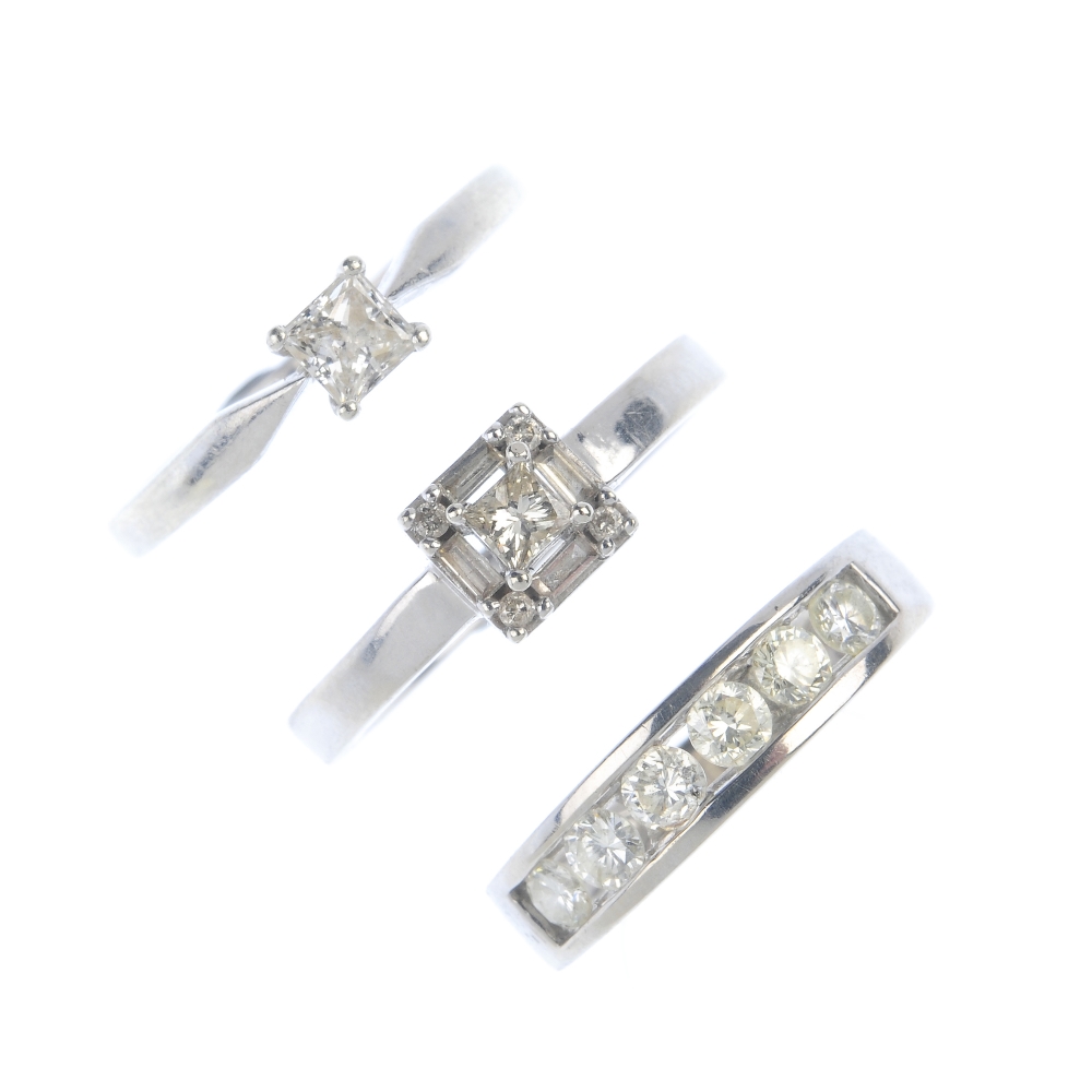 A selection of three diamond rings. To include a 9ct gold square-shape diamond single-stone ring,