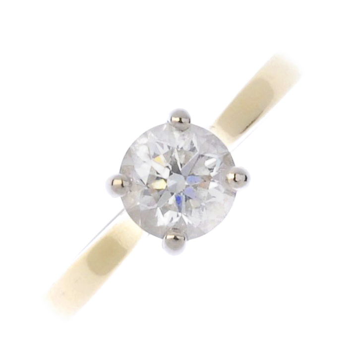 (174110) An 18ct gold diamond single-stone ring. The brilliant-cut diamond to the tapered