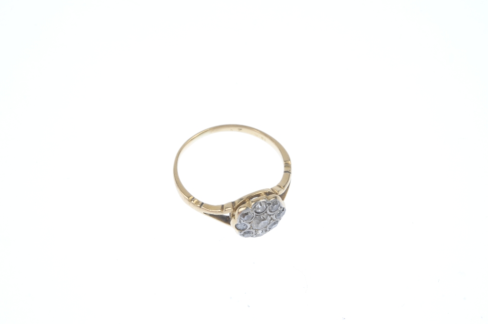 A mid 20th century 18ct gold diamond cluster ring. The old-cut diamond, within a single-cut - Image 2 of 3