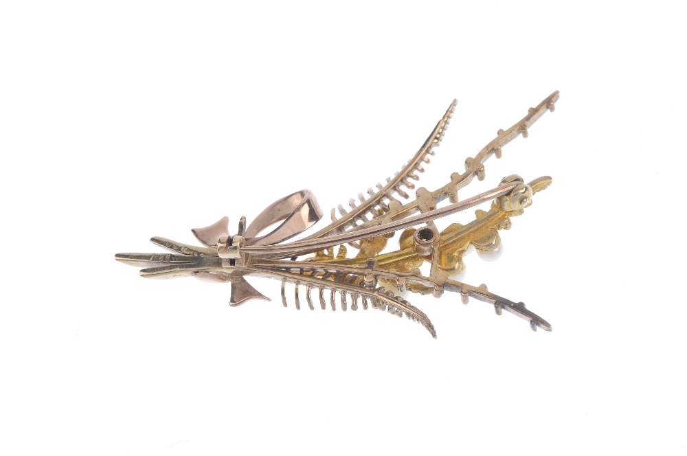 A 9ct gold cultured pearl foliate brooch. Designed as a fern, with cultured pearl accents and bow - Image 2 of 2