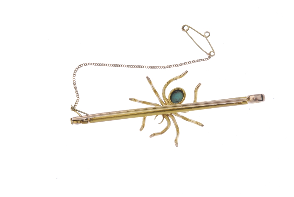 An early 20th century 9ct gold gem-set spider bar brooch. The oval turquoise cabochon and seed pearl - Image 2 of 2