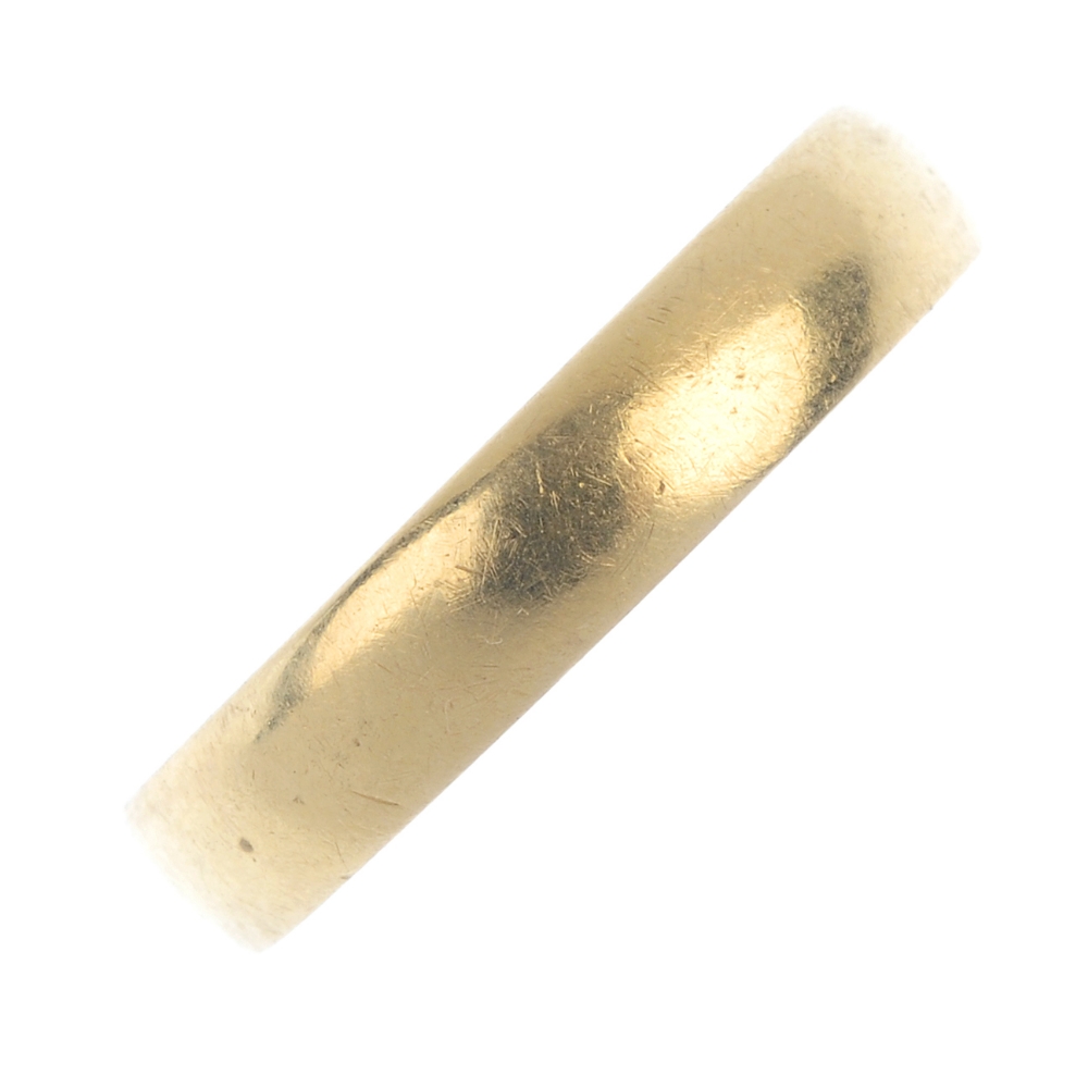 An early 20th century 18ct gold band ring. Hallmarks for Birmingham, 1918. Weight 5.6gms. For any