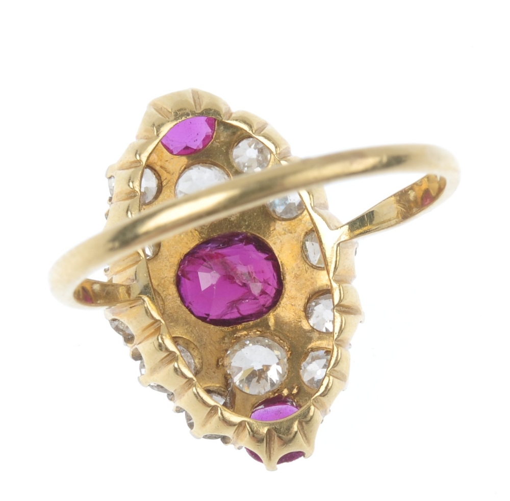 A mid 20th century 18ct gold and platinum, ruby and diamond dress ring. Of marquise-shape outline, - Image 2 of 3