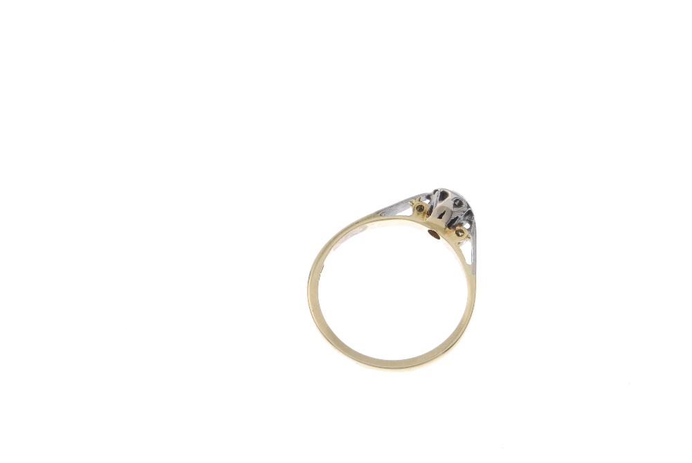 An 18ct gold diamond single-stone ring. The circular-cut diamond, to the foliate engraved - Image 3 of 3