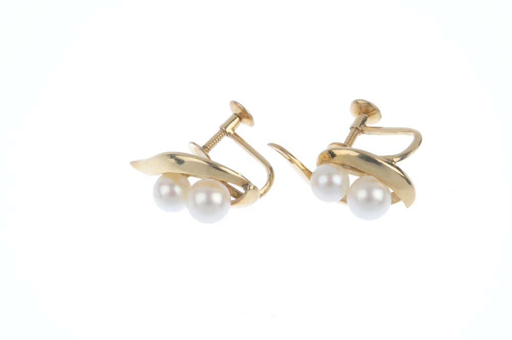 MIKIMOTO - a pair of cultured pearl ear clips. Each designed as two graduated pearls, measuring 6. - Image 2 of 2