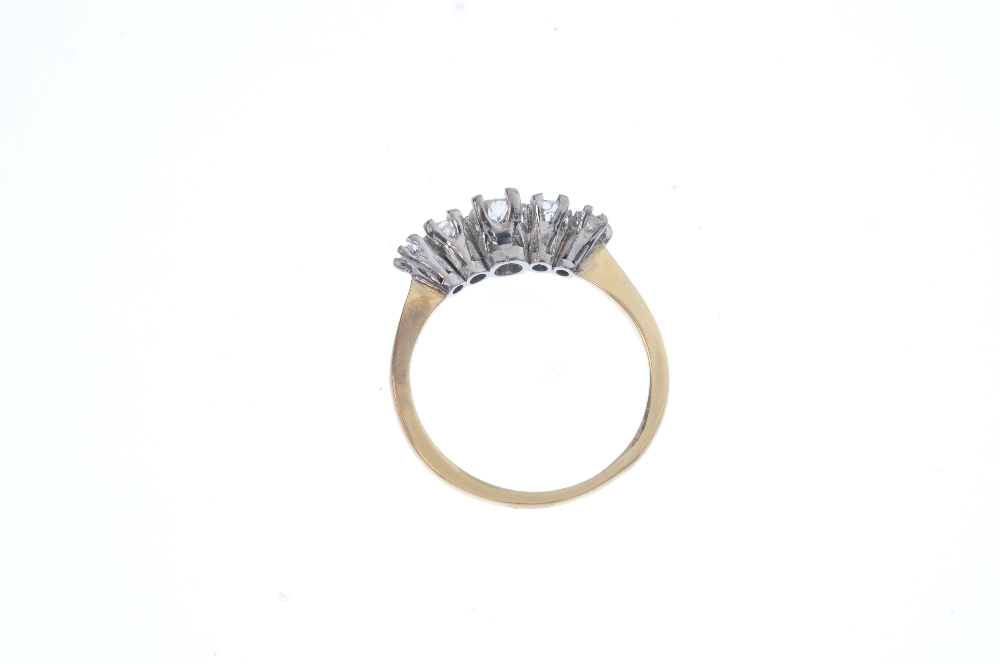 A diamond five-stone ring. The graduated old-cut diamond line, to the tapered shoulders and plain - Image 4 of 4