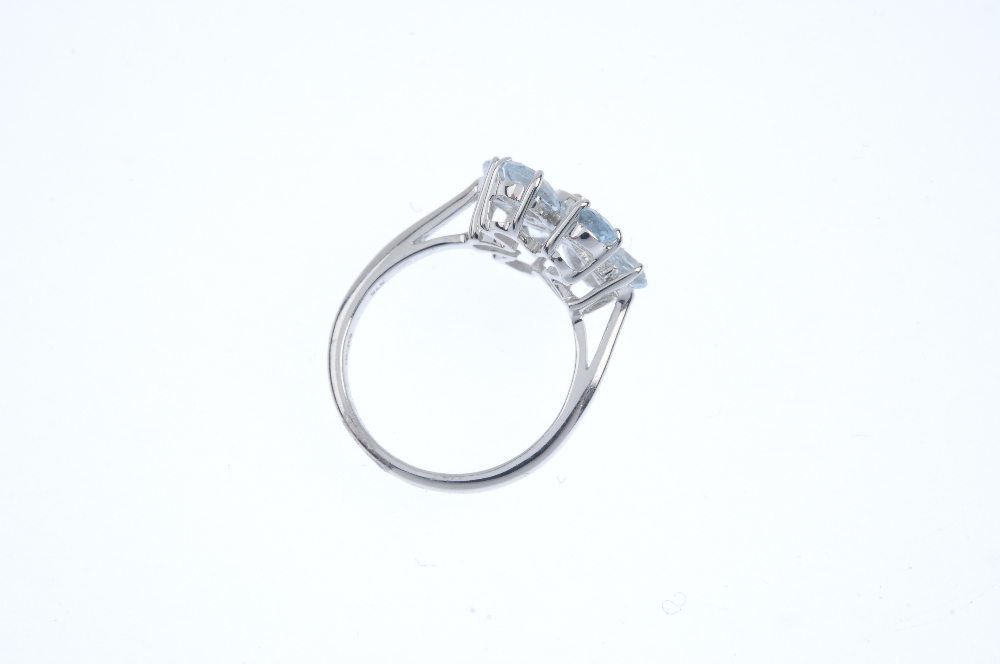 A 9ct gold aquamarine floral cluster ring. The single-cut diamond collet, within a pear-shape - Image 3 of 3