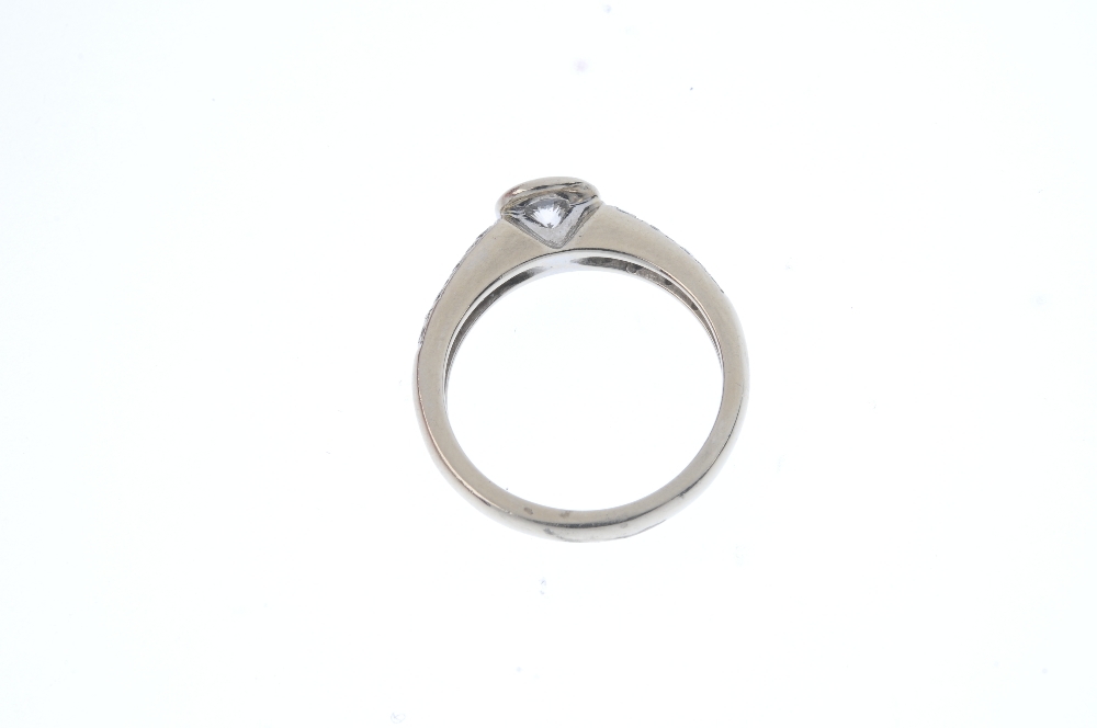 An 18ct gold diamond single-stone ring. The brilliant-cut diamond collet, to the pave-set diamond - Image 4 of 4