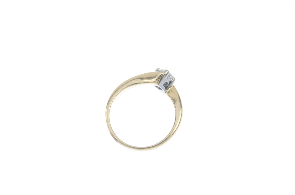 An 18ct gold diamond single-stone ring. The brilliant-cut diamond, to the asymmetric shoulders. - Image 3 of 3
