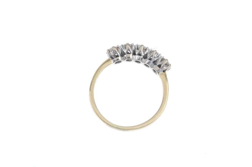 A diamond five-stone ring. The brilliant-cut diamond line, to the plain band. Estimated diamond - Image 3 of 3