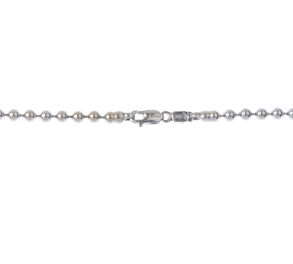(176238) THEO FENNELL- an 18ct gold charm necklace. Designed as a pave-set diamond and black gem - Image 4 of 4