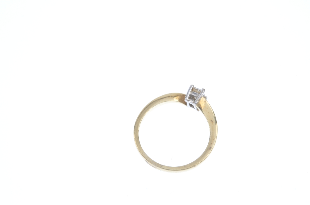 An 18ct gold diamond single-stone ring. The rectangular-shape diamond, to the asymmetric shoulders - Image 3 of 3