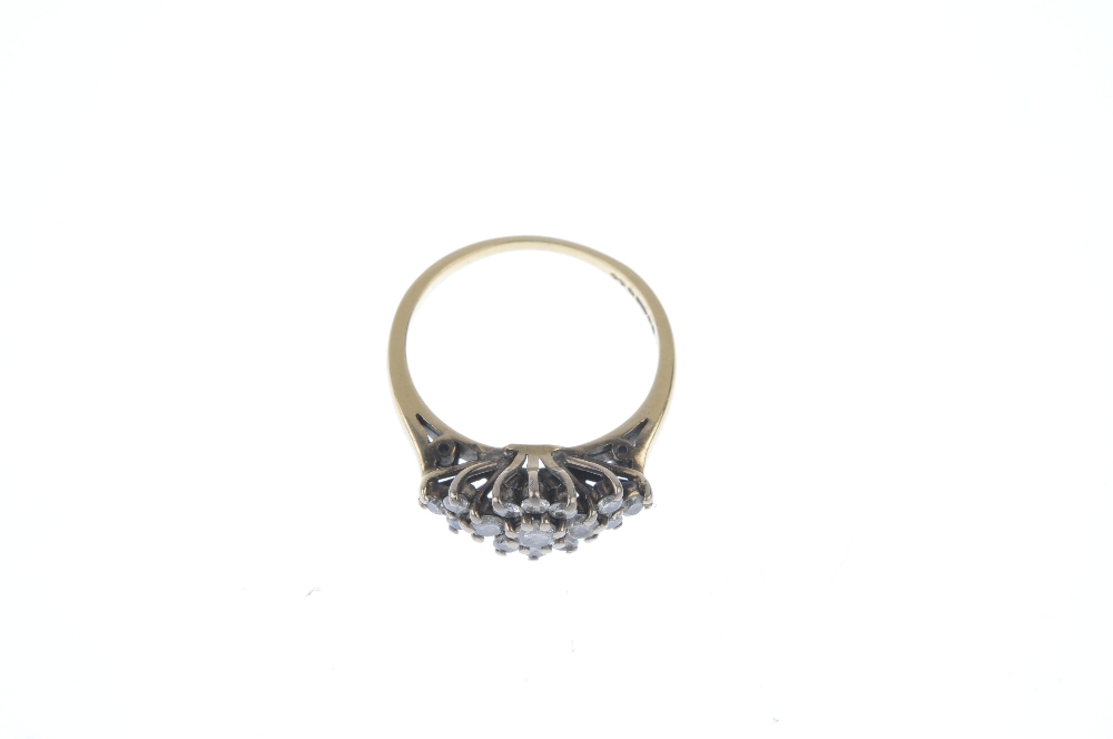 An 18ct gold diamond floral cluster ring. The brilliant-cut diamond cluster, with similarly-cut - Image 2 of 3