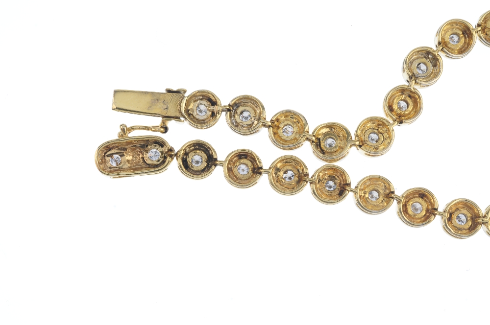 A 9ct gold diamond line bracelet. Designed as a series of brilliant-cut diamond, wide collet - Image 3 of 3