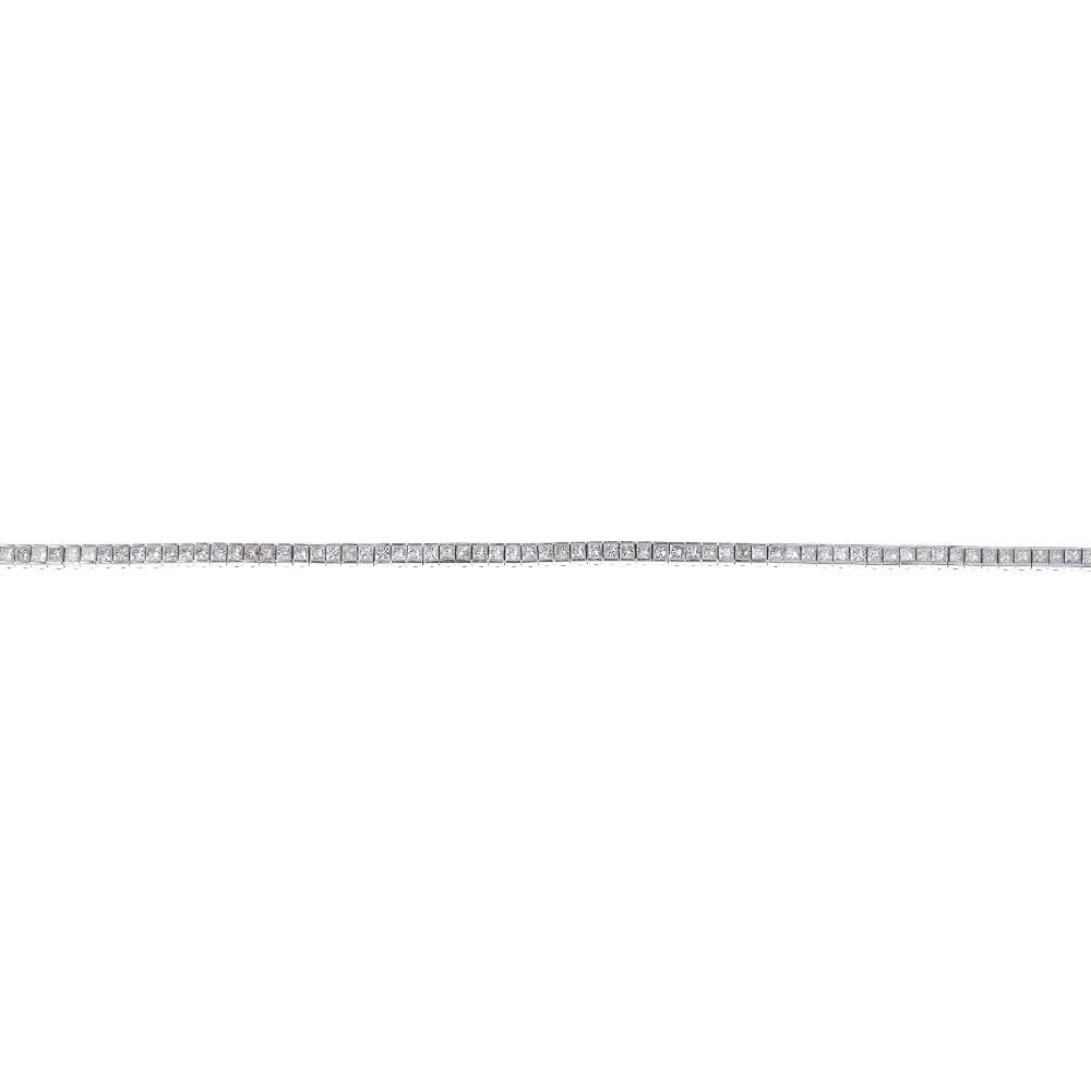 (187921) A diamond line bracelet. Designed as a line of square-shape diamonds to the partially