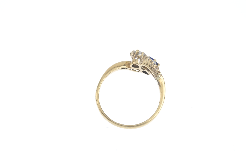 An early 20th century 18ct gold sapphire and diamond two-stone crossover ring. The cushion-shape - Image 3 of 3