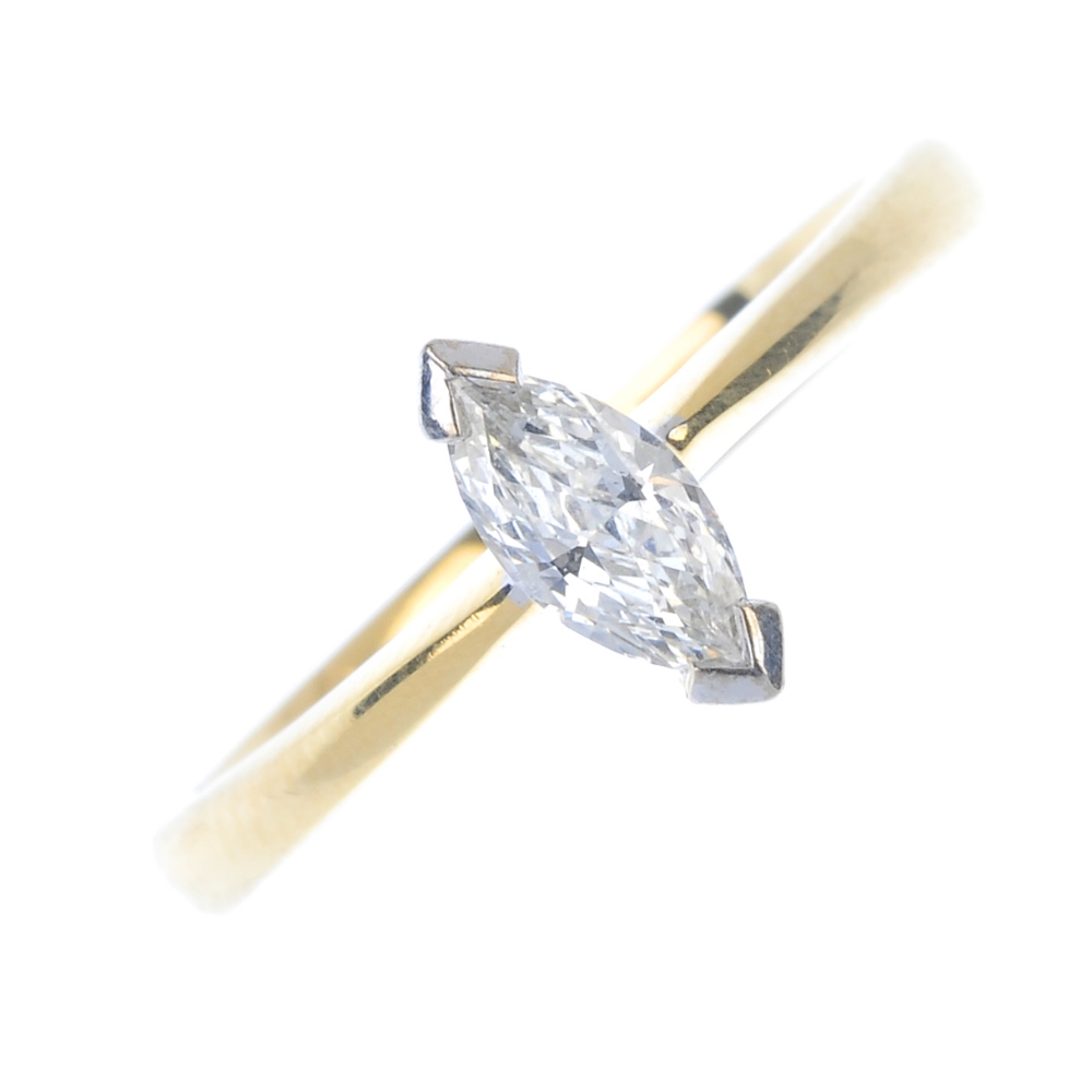 An 18ct gold diamond single-stone ring. The marquise-shape diamond, to the tapered band. Diamond