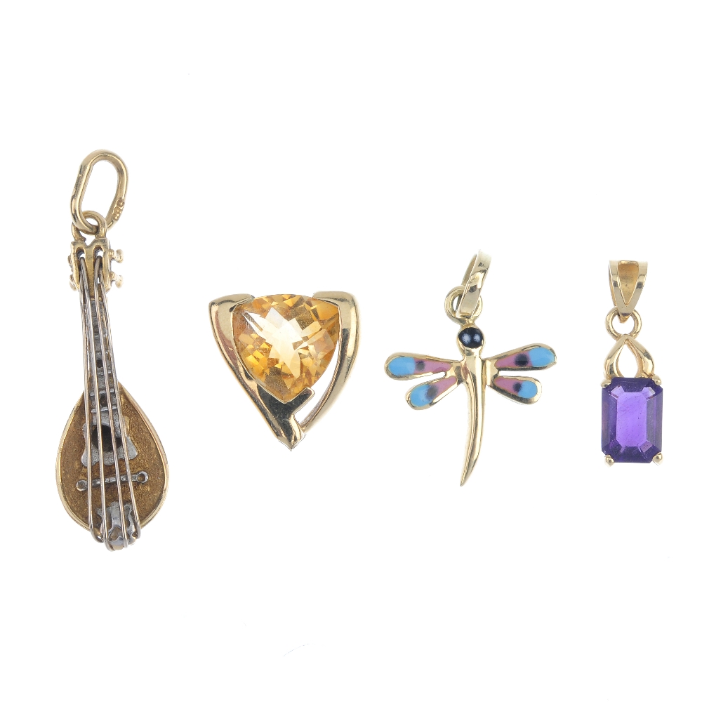 A selection of five mostly gem-set pendants. To include a 9ct gold graduated pink sapphire, topaz