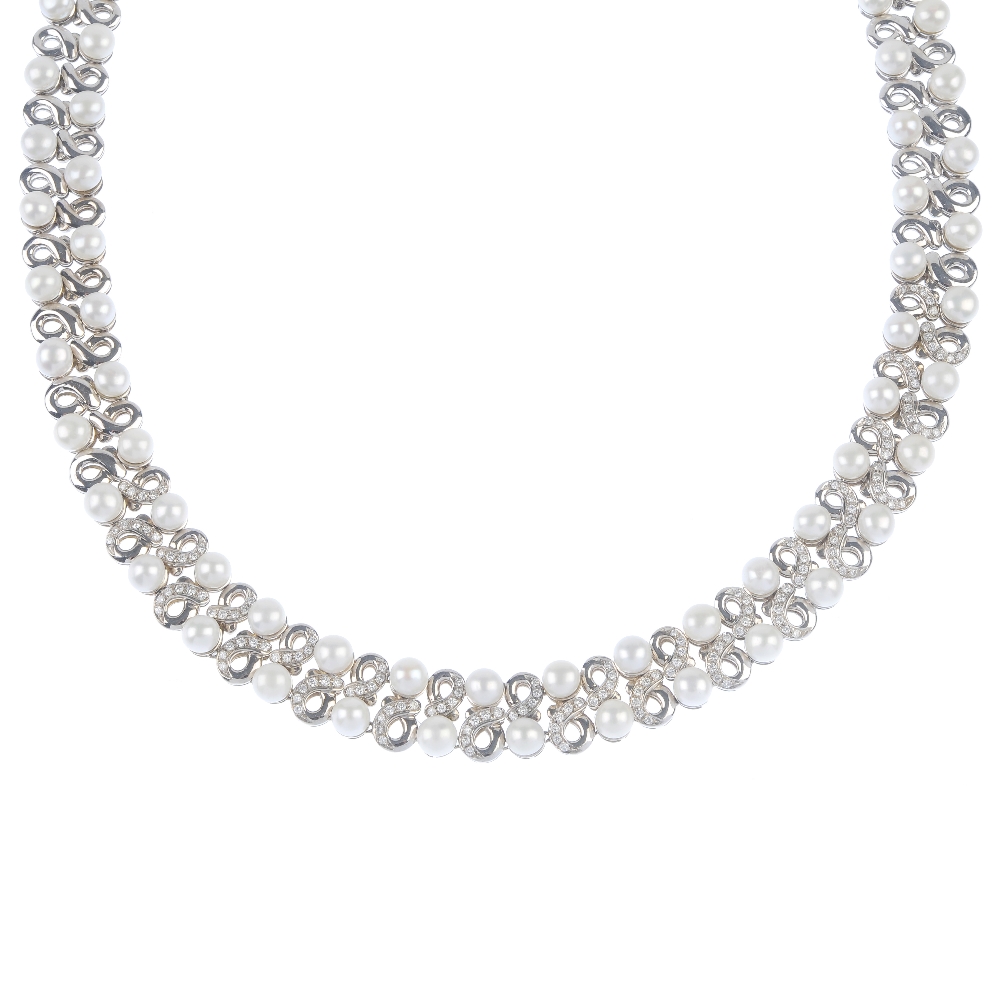 CHANTECLER - a 'capri' cultured pearl and diamond necklace. Designed as a series of scroll links,