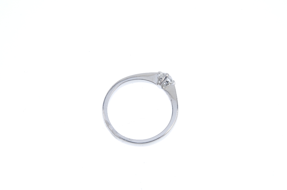 A platinum diamond single-stone ring. The brilliant-cut diamond, to the tapered shoulders and - Image 3 of 3