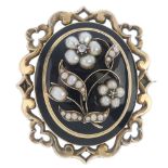 A mid Victorian gold, enamel, split pearl and diamond memorial brooch. The central black enamel