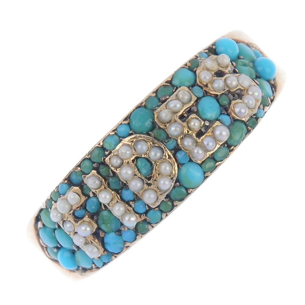 A late 19th century, 18ct gold turquoise and split pearl 'Fides' ring. The ring set with turquoise
