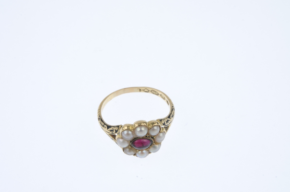 An early 19th century 18ct gold memorial ring. Designed as a central oval-shape cabochon garnet, - Image 2 of 4