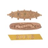 Three late 19th to early 20th century gold name badges. The first designed as a marquise shape