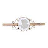 A cameo bar brooch. The centrally mounted chalcedony carved to depict a classical gentleman, to