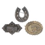 Six Victorian silver brooches. To include one in the shape of a horseshoe, a bar brooch with heart