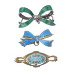 A selection of enamel jewellery. To include a blue enamel fleur-de-lys brooch, together with a green