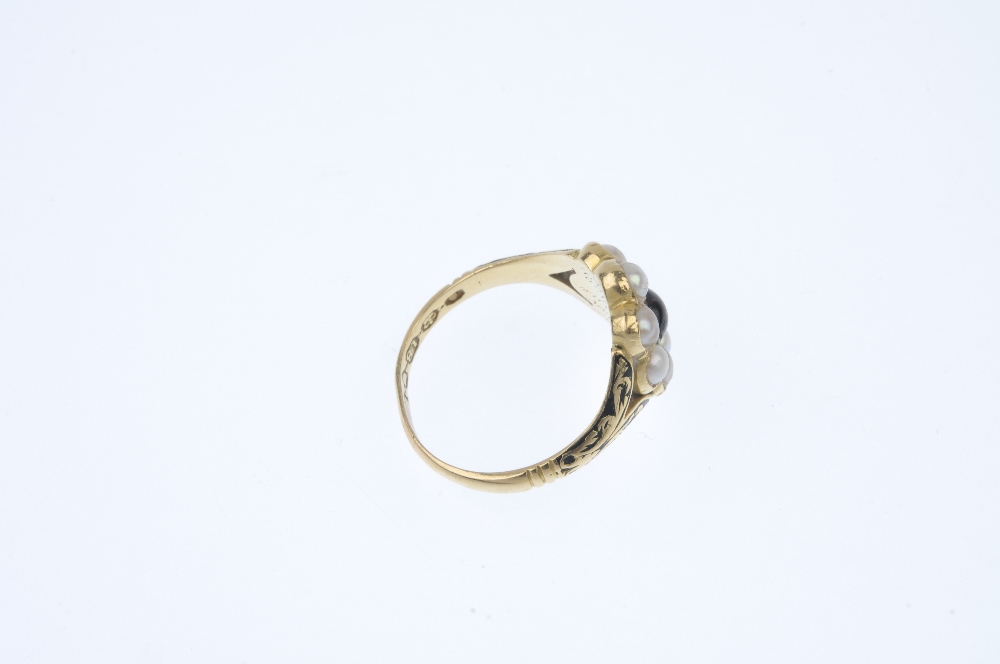 An early 19th century 18ct gold memorial ring. Designed as a central oval-shape cabochon garnet, - Image 4 of 4