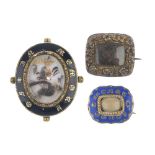 Three items of mid to late Victorian mourning jewellery. To include a brooch with floral border