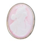 A cameo brooch. The pink shell carved to depict the Goddess Diana, to the rope-twist surround.
