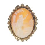A cameo brooch. Of oval outline and depicting one of the Three Wise Men, pointing to the sky, to the