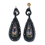 A pair of jet earrings. Both designed as pear-drop shapes with openwork surrounds and lacquered,