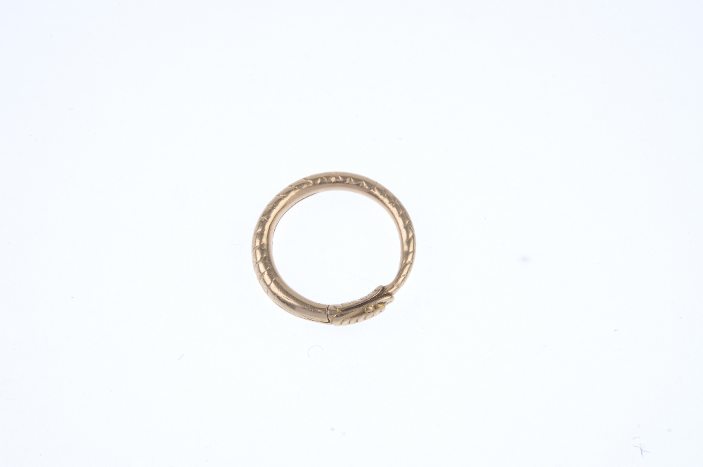 A mid 19th century 15ct gold Ouroboros suspension ring. Designed as a snake eating its own tail, - Image 2 of 3