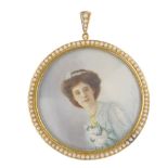 An early 20th century 9ct gold split pearl portrait miniature pendant. The circular-shape portrait